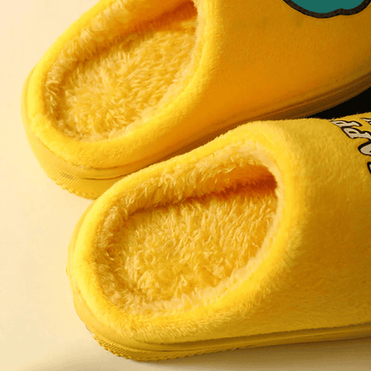 Warm and padded home slippers for children with monster