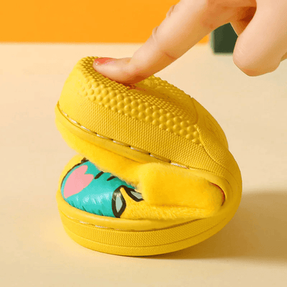 Warm and padded home slippers for children with monster