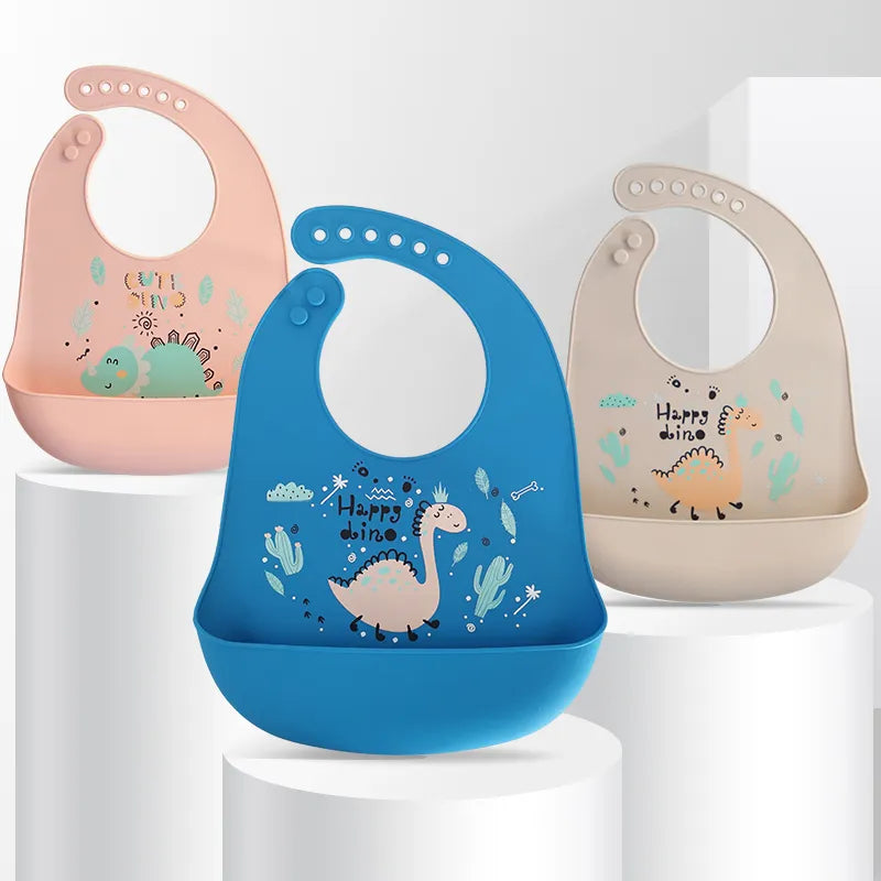 Dino-Delight Waterproof Baby Bibs: Keep Your Little Explorer Clean and Stylish!